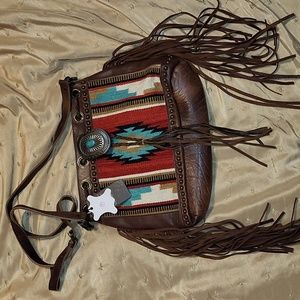 Leather fringe purse